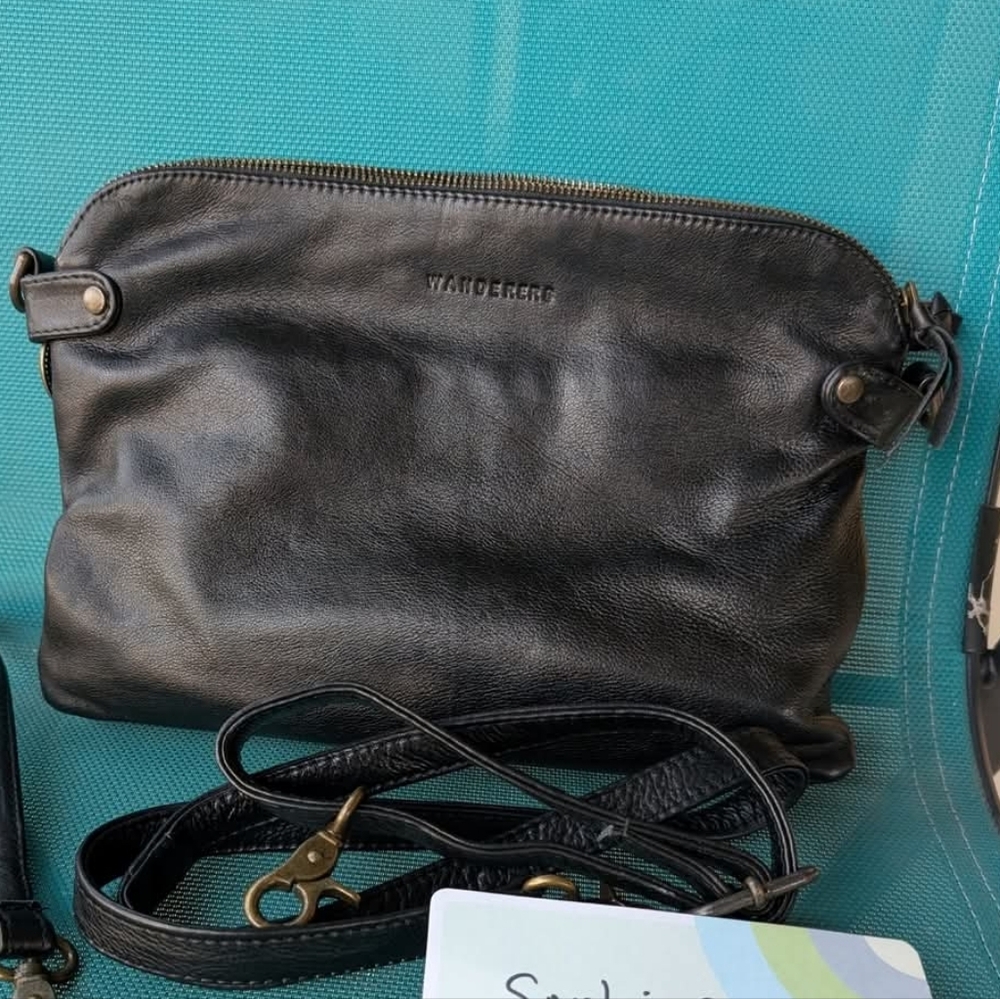 Wanderers Travel Co black Venetian Grande crossbody